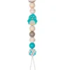 Accroche-tétine pingouin turquoise - Goki