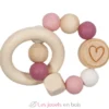 Hochet en bois et silicone cœur rose - Goki